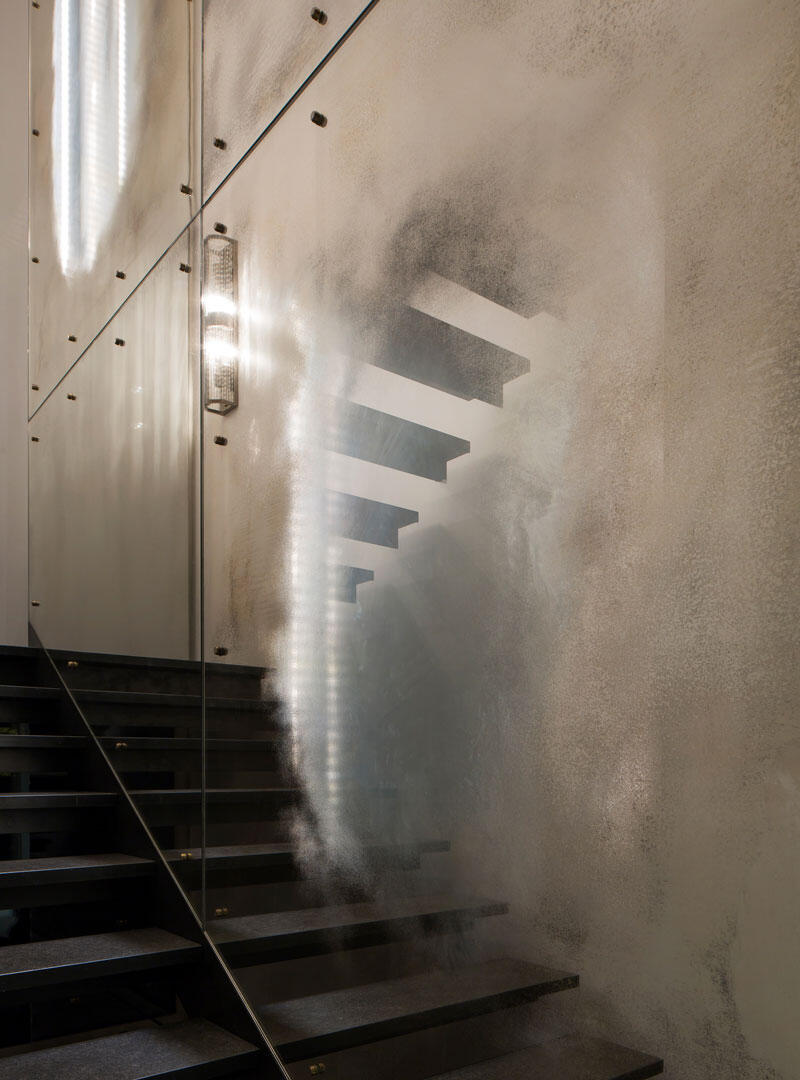 Glass stairwell with Lagune hand silvered finishing